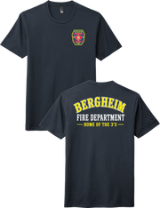 A dark navy blue short-sleeve t-shirt shown from both front and back. The front features a small Bergheim Fire Department shield logo on the left chest.