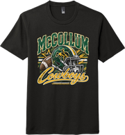 A black short-sleeve crewneck t-shirt featuring a 'McCollum Cowboys' football graphic on the front, including a helmet, football, and stars in green, yellow, and white.