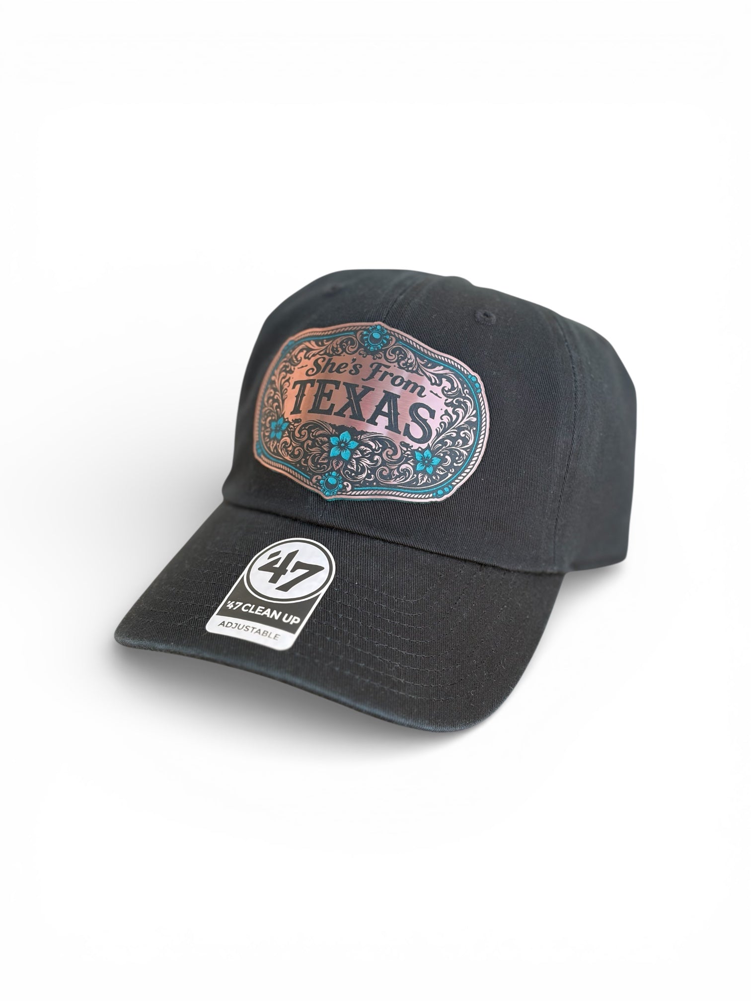 Black cap with 'She's From Texas' and '47' logo on a white background