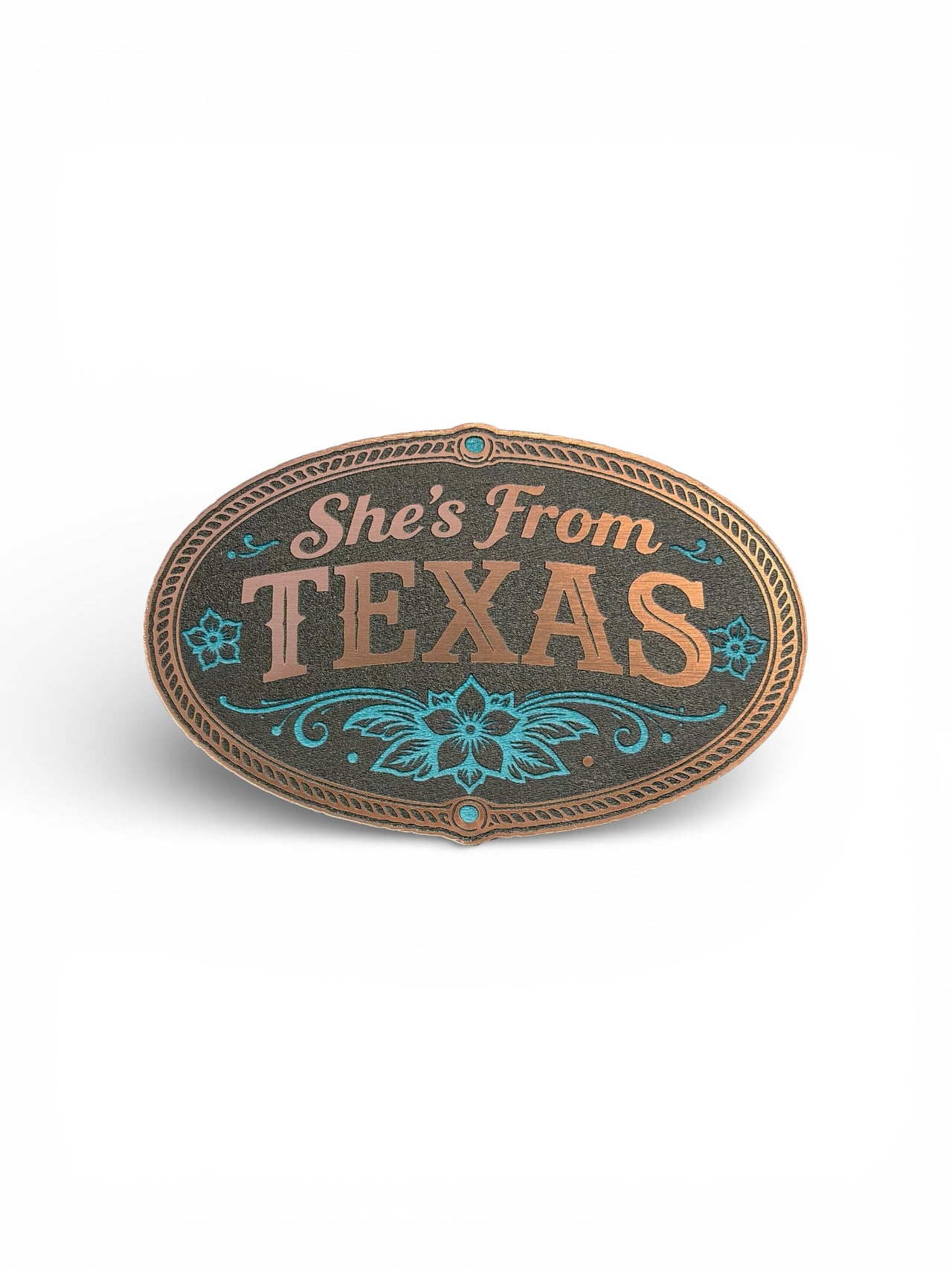 Decorative sign with 'She's From Texas' text on a white background