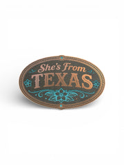 Decorative sign with 'She's From Texas' text on a white background