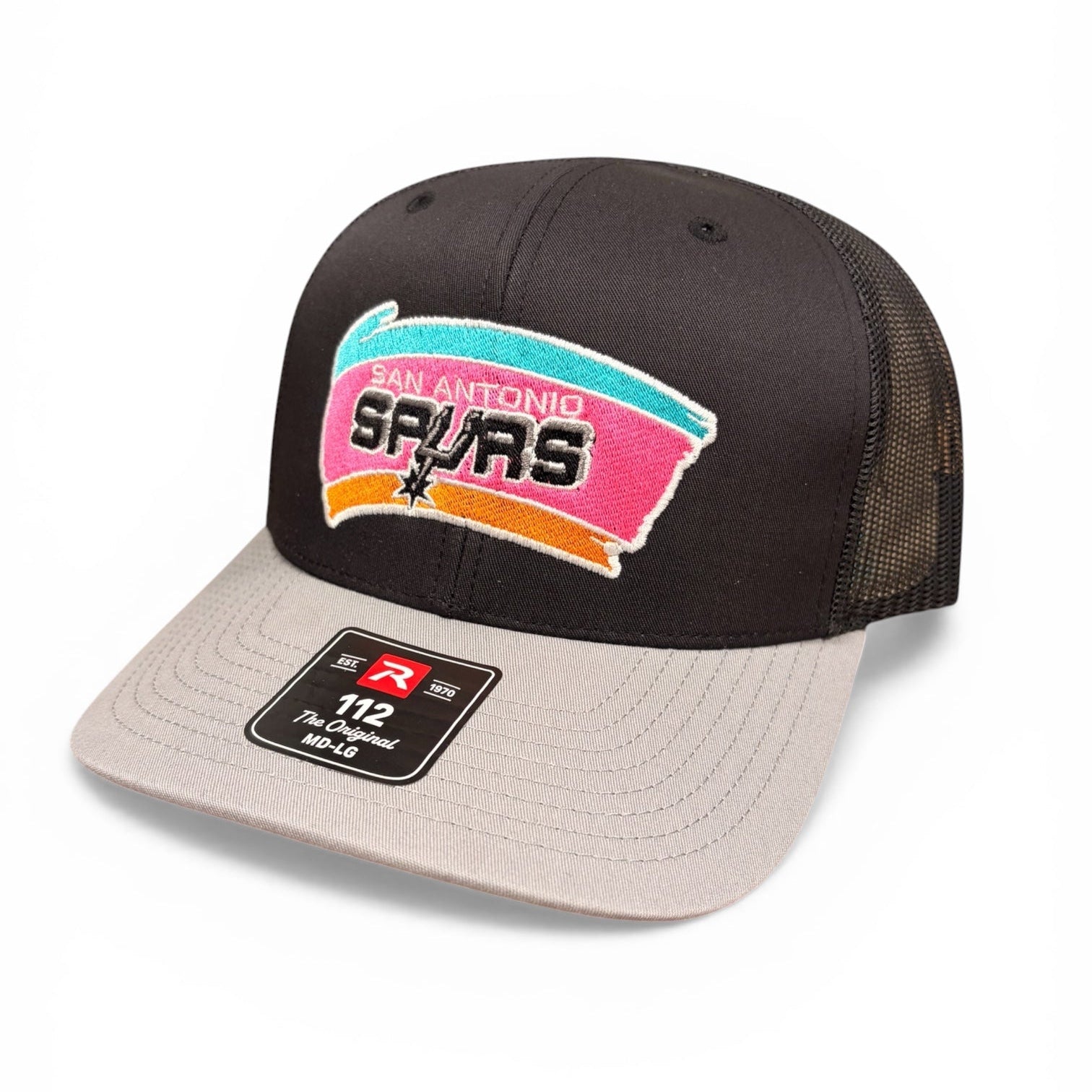 Black and beige cap with San Antonio Spurs logo on a white background